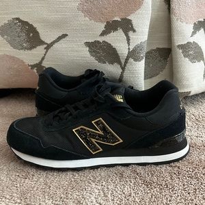 Woman’s New Balance 515, black with gold accents, great condition!